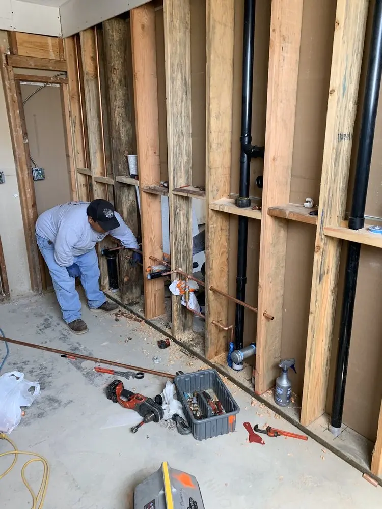 Commercial rough-in plumbing for Water Heater Replacement in Orange Court